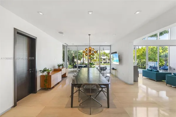 a kitchen with stainless steel appliances a stove a microwave and a refrigerator