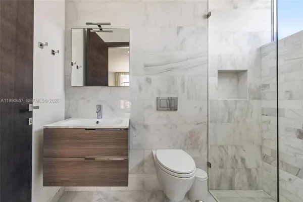 a view of a patio with furniture and a yard