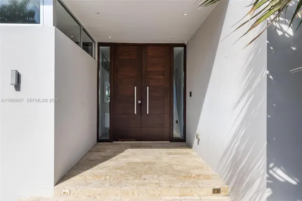 a view of swimming pool with a table and chairs