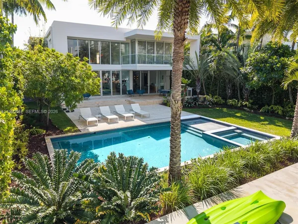 a backyard of a house with seating space