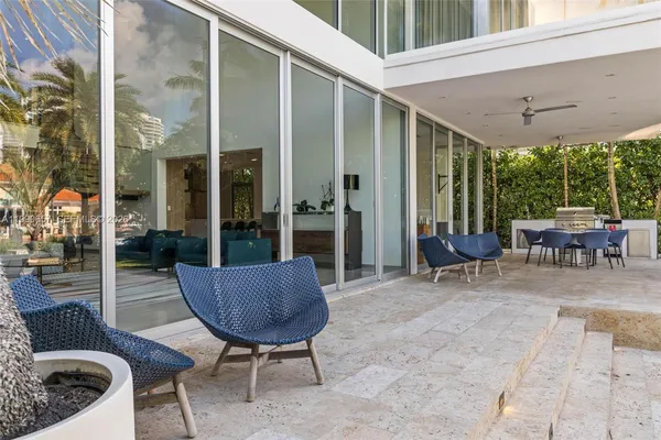 an aerial view of a house with a lake view