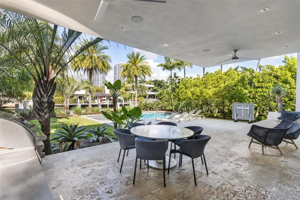 an aerial view of a city with ocean view