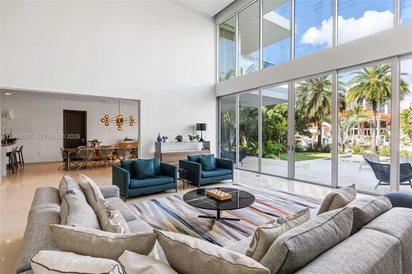 a living room with a couch and a rug