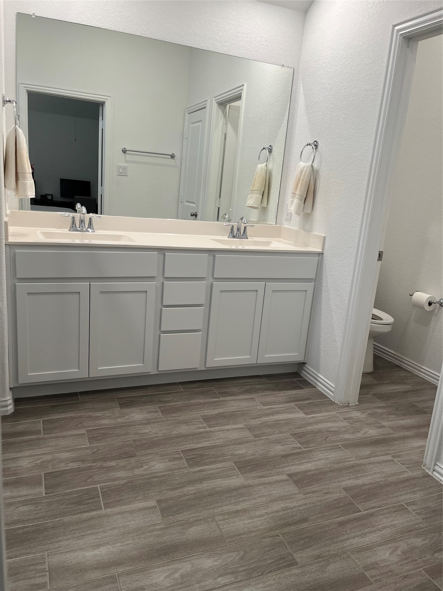 14242 Amherst Mdw Trail Rosharon, TX 77583 - Photo 26 of 36 Beautiful Tile Flooring Throughout Primary Bathroom.