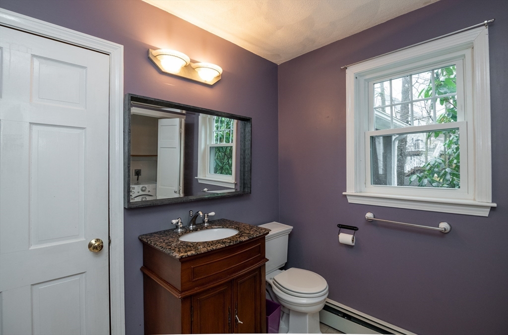 159 Willow Street Acton, MA 01720 - Photo 22 of 34 a bathroom with a sink and a mirror
