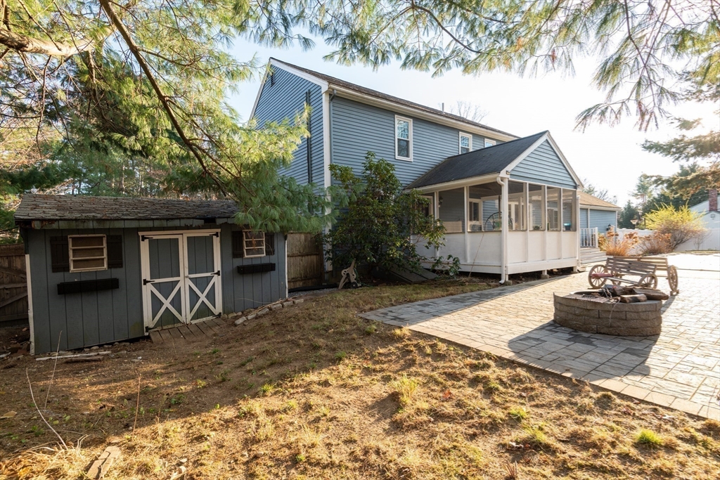 159 Willow Street Acton, MA 01720 - Photo 25 of 34 a front view of a house with a yard
