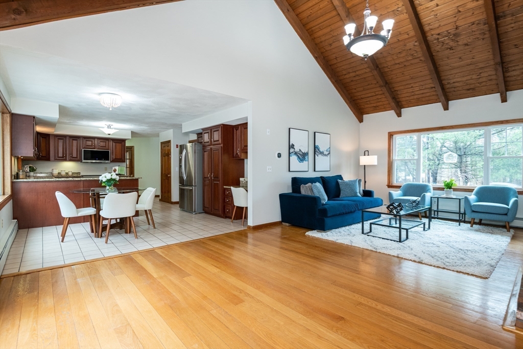 159 Willow Street Acton, MA 01720 - Photo 9 of 34 a living room with furniture and a large window