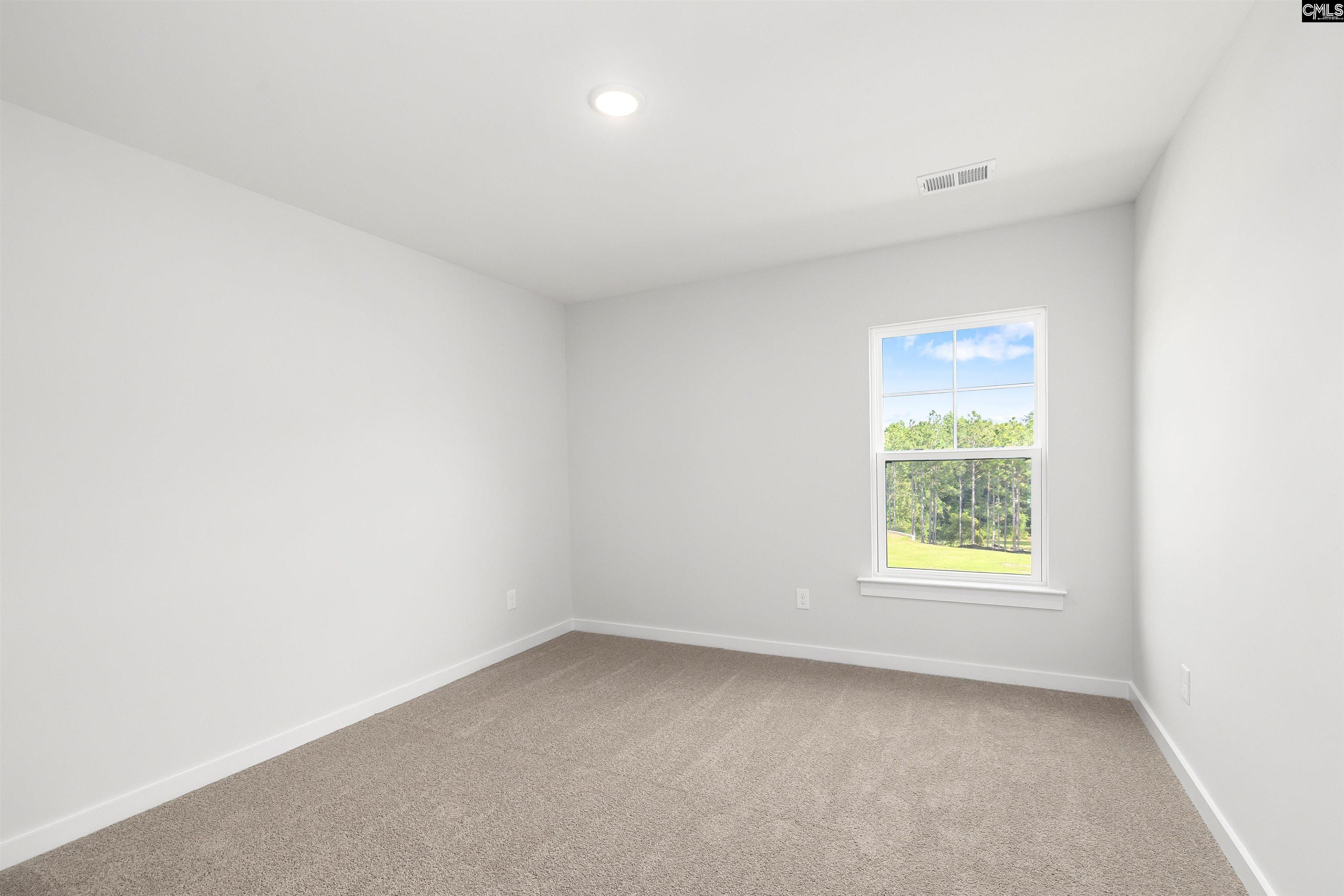 32 Fawn Spot Court Elgin, SC 29045 - Photo 26 of 28 an empty room with a window