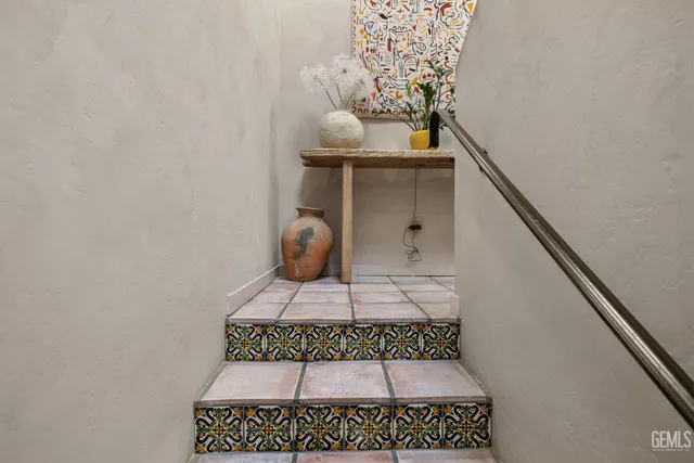 a living room filled with furniture and a window