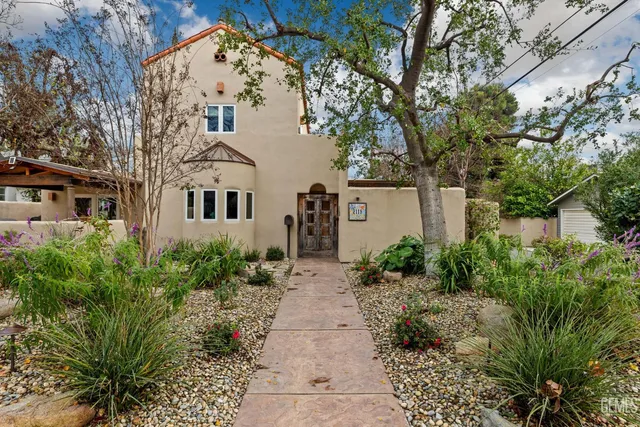 a view of a hallway with seating area