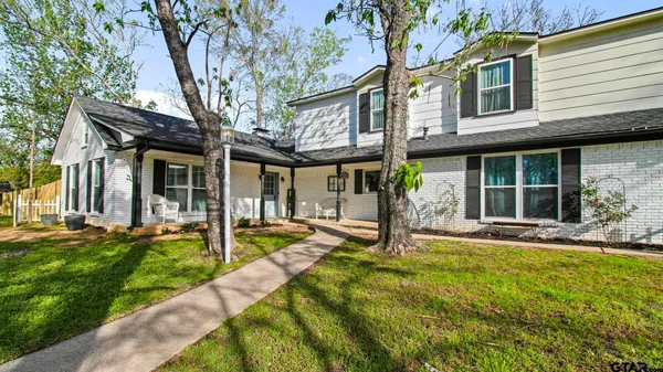 a house view with a garden space