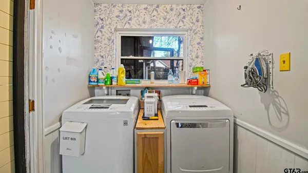 a utility room with dryer and washer
