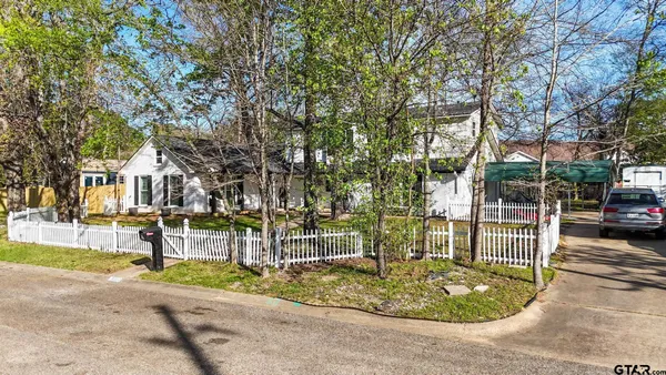 a view of street with parked cars
