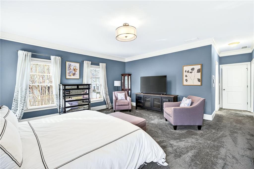 455 High Pointe Trail Roswell, GA 30076 - Photo 24 of 46 a bedroom with a bed and a television