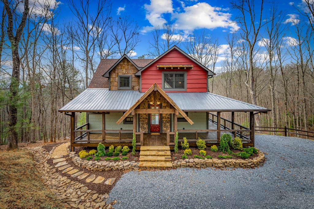 895 Price Road Blue Ridge, GA 30513 - Photo 19 of 140 a front view of a house with a yard