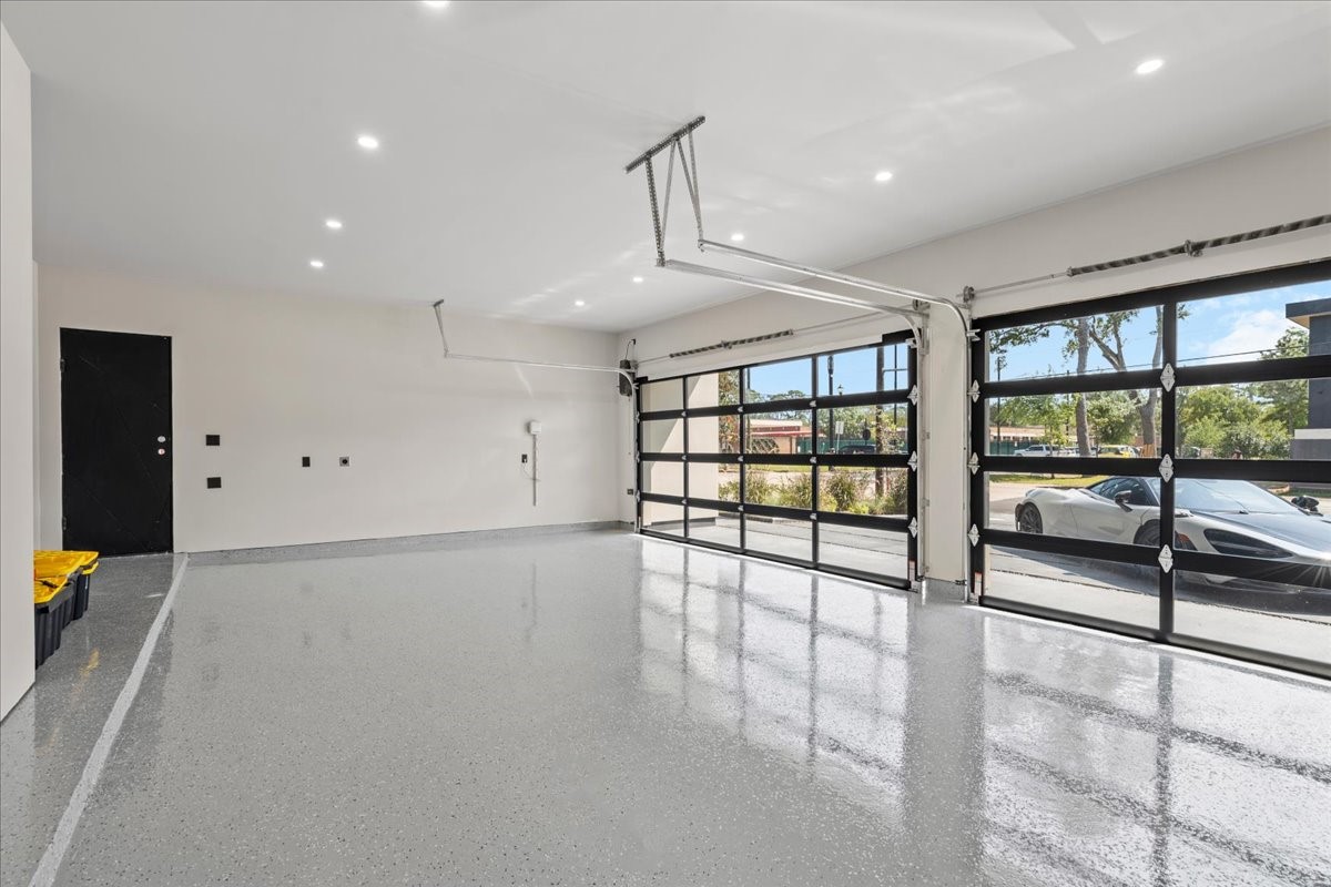827 Bunker Hill Road Houston, TX 77024 - Photo 23 of 49 Three car garage