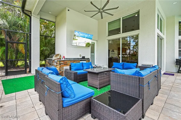 a outdoor space with patio the couches and a dining table with garden view