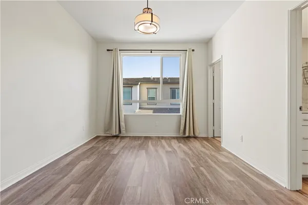 a view of an empty walk in closet