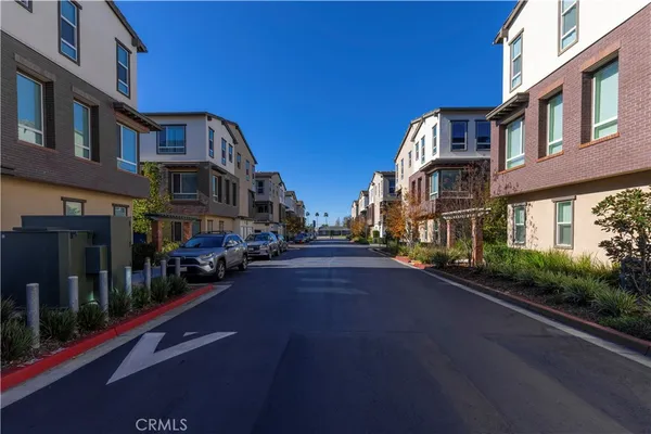 a city street lined with tall buildings