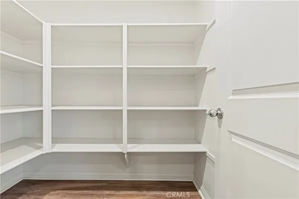 a view of an empty walk in closet