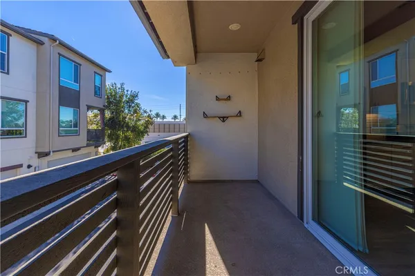 a view of balcony and yard