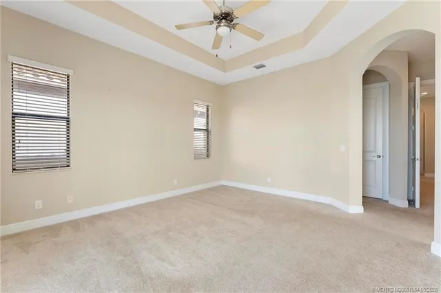 a bathroom with a toilet a sink and shower