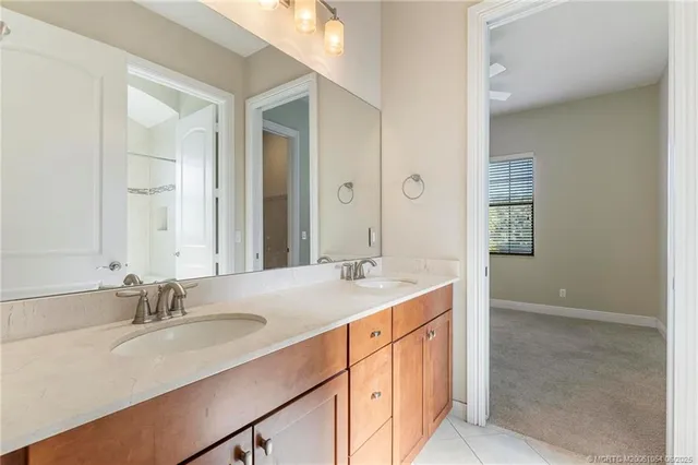 a view of an empty room and a window