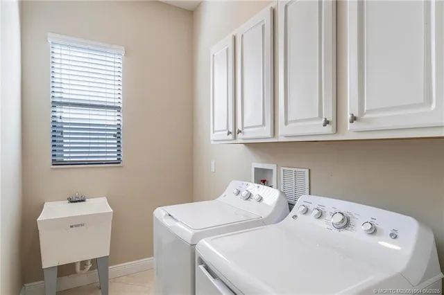 a view of an empty room with windows