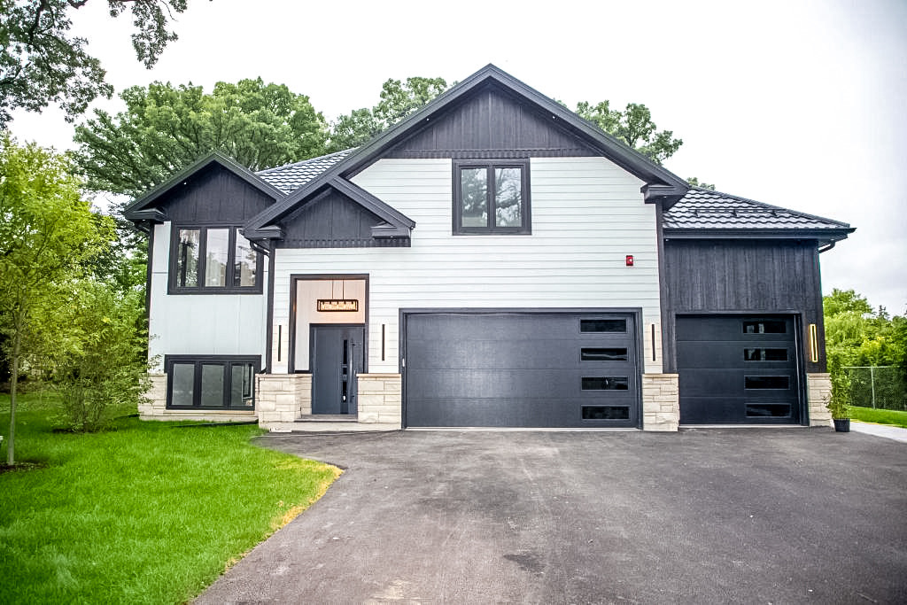 9517 Forest Place Des Plaines, IL 60016 - Photo 1 of 14 front view of a house with a yard