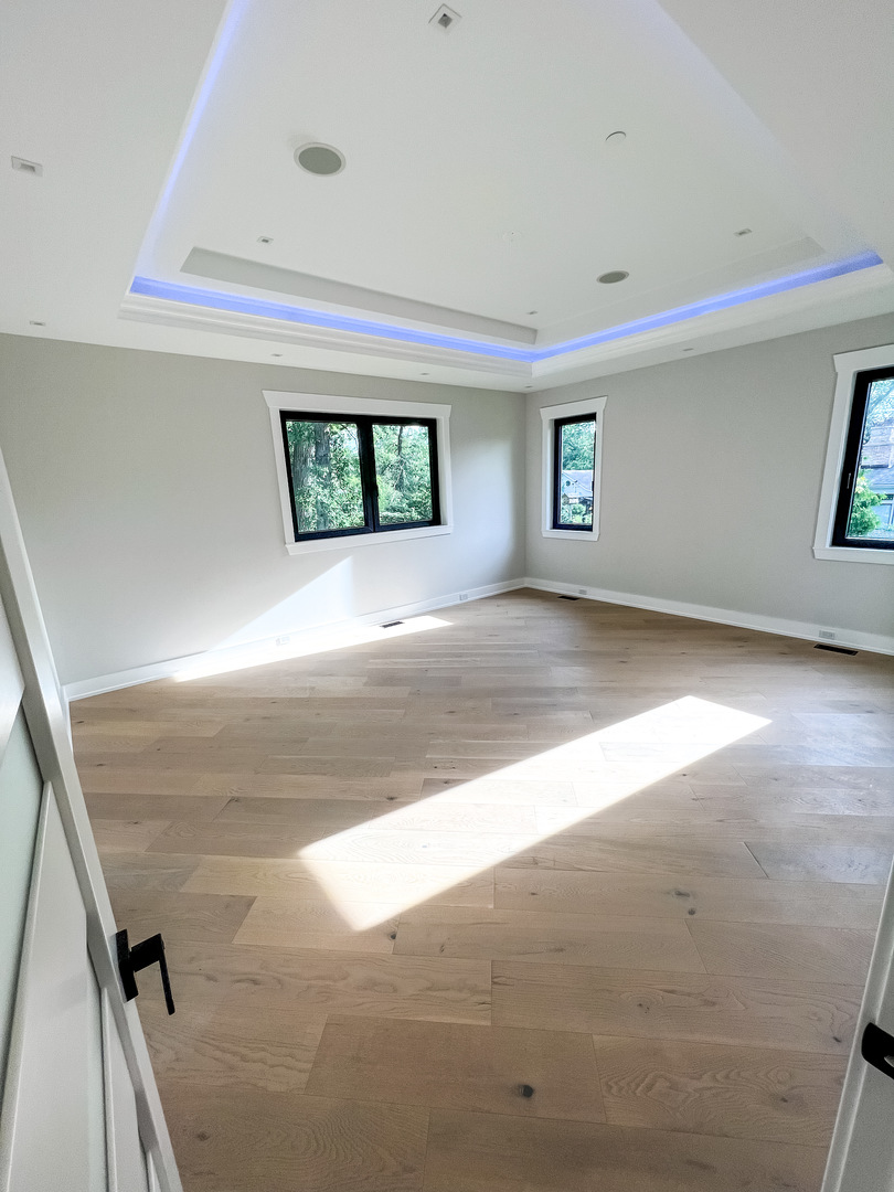 9517 Forest Place Des Plaines, IL 60016 - Photo 4 of 14 a view of a hallway with a window