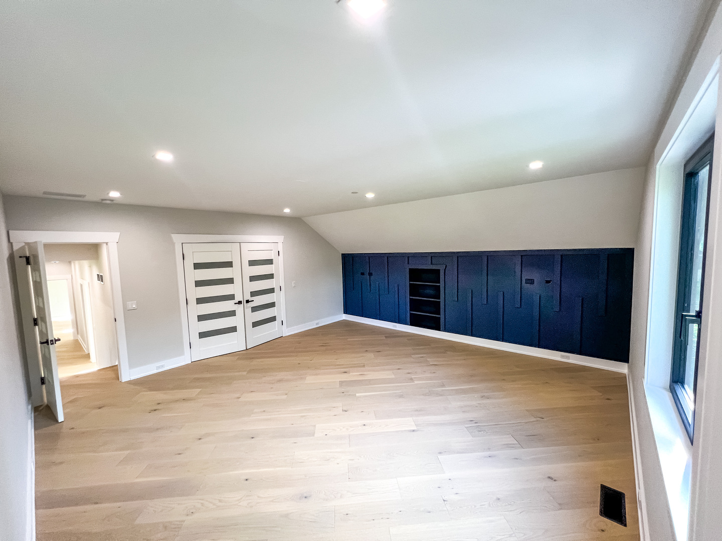 9517 Forest Place Des Plaines, IL 60016 - Photo 7 of 14 a view of an empty room with a closet and a window