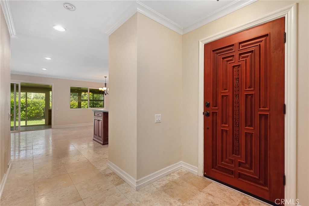 3413 Punta Alta, Unit A Laguna Woods, CA 92637 - Photo 5 of 45 an empty room with windows and closet