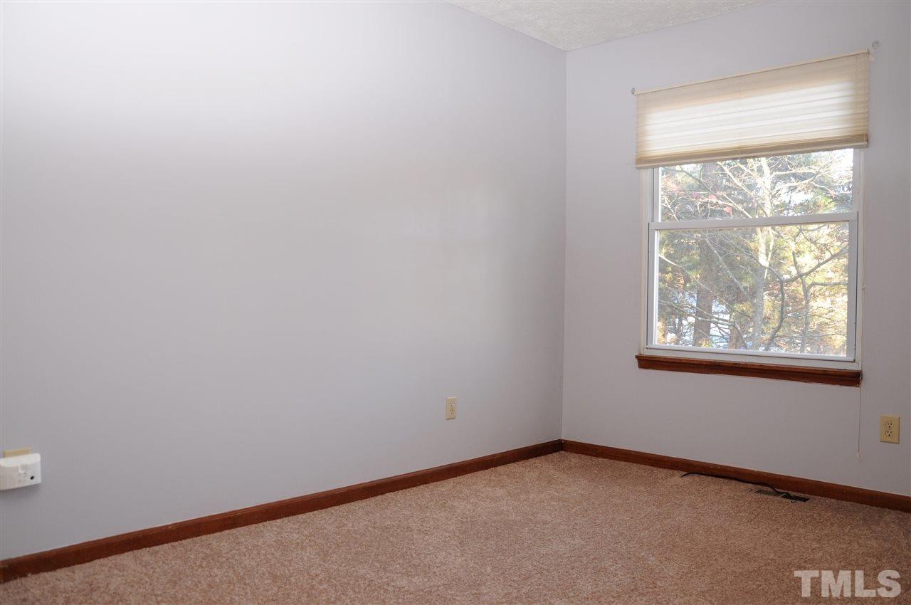 5104 Ranada Court Raleigh, NC 27616 - Photo 8 of 14 an empty room with a window