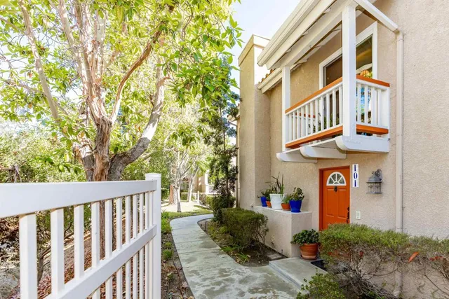 a front view of a building with garden