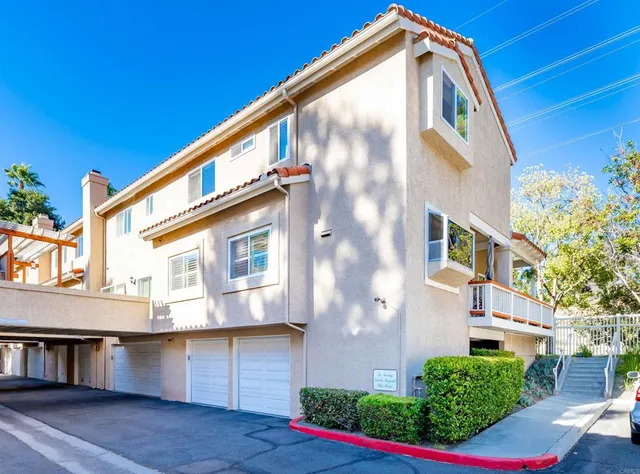 a front view of a house with yard