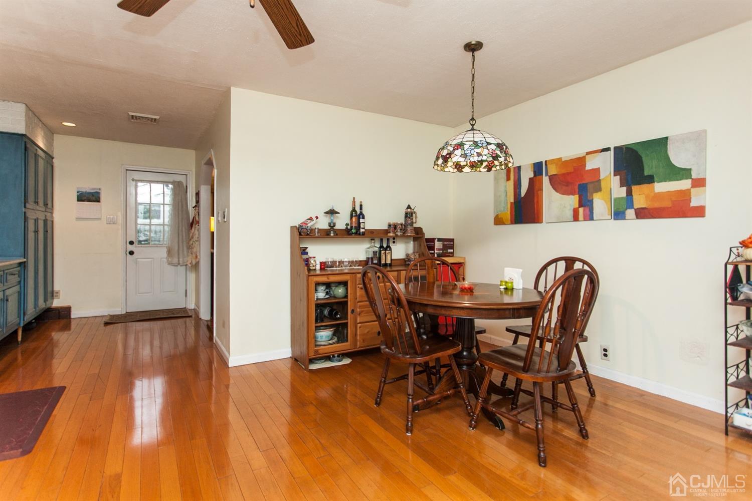 111 Alfred Street Edison, NJ 08820 - Photo 7 of 15 a view of a dining room with furniture and wooden floor