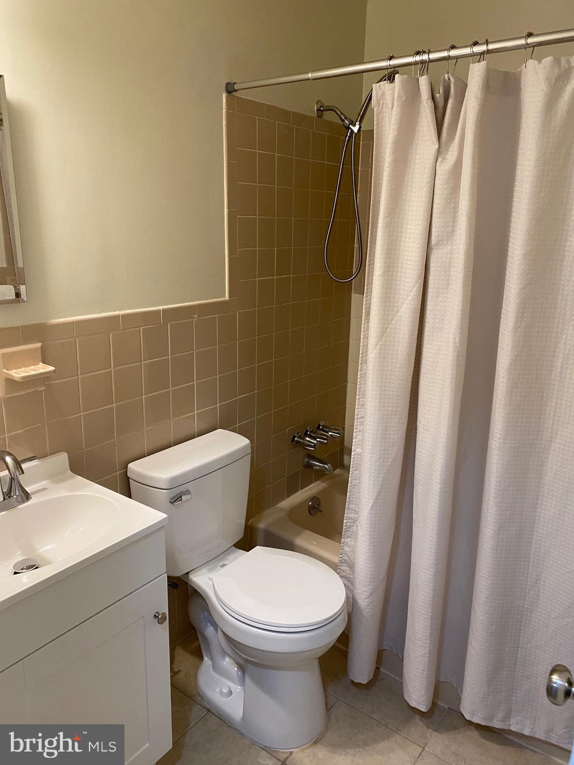 45255 Cove Manor Road California, MD 20619 - Photo 10 of 15 hall bath, new sink, toilet &med cabinet