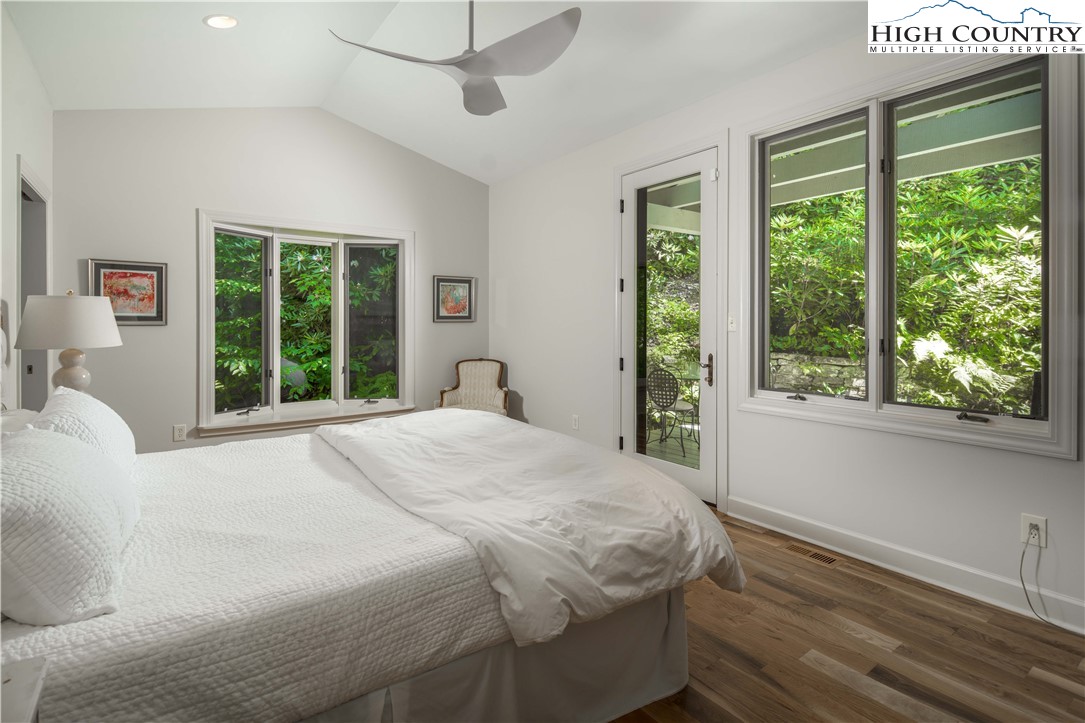 509 Twin Rivers Drive Boone, NC 28607 - Photo 25 of 50 a bedroom with a large bed and a large window