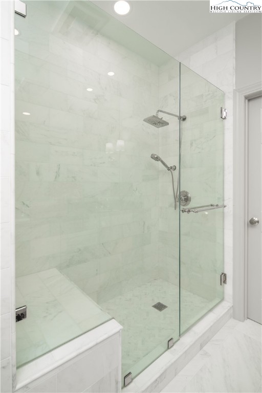 509 Twin Rivers Drive Boone, NC 28607 - Photo 28 of 50 a bathroom with a shower and a bathtub