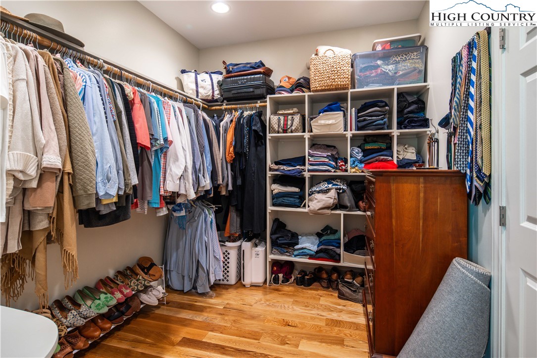 509 Twin Rivers Drive Boone, NC 28607 - Photo 30 of 50 a view of walk in closet with clothes and shoes