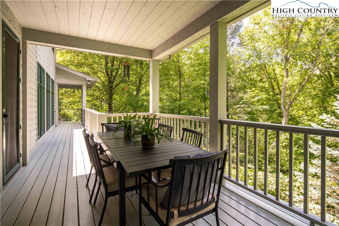 509 Twin Rivers Drive Boone, NC 28607 - Photo 46 of 50 a view of a dining room with furniture window and wooden floor