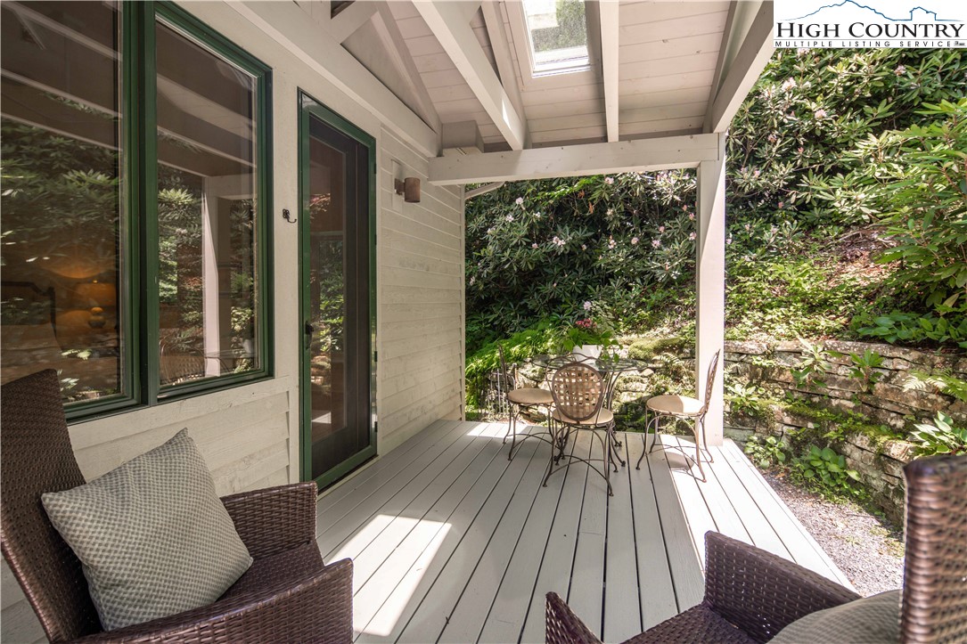 509 Twin Rivers Drive Boone, NC 28607 - Photo 50 of 50 a view of balcony with chairs and wooden floor