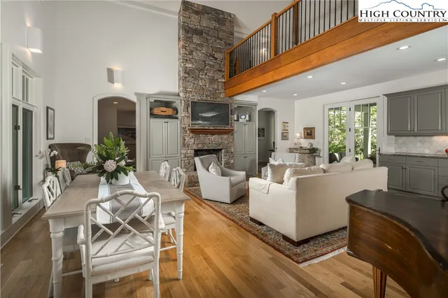 a kitchen with granite countertop a sink stainless steel appliances and cabinets