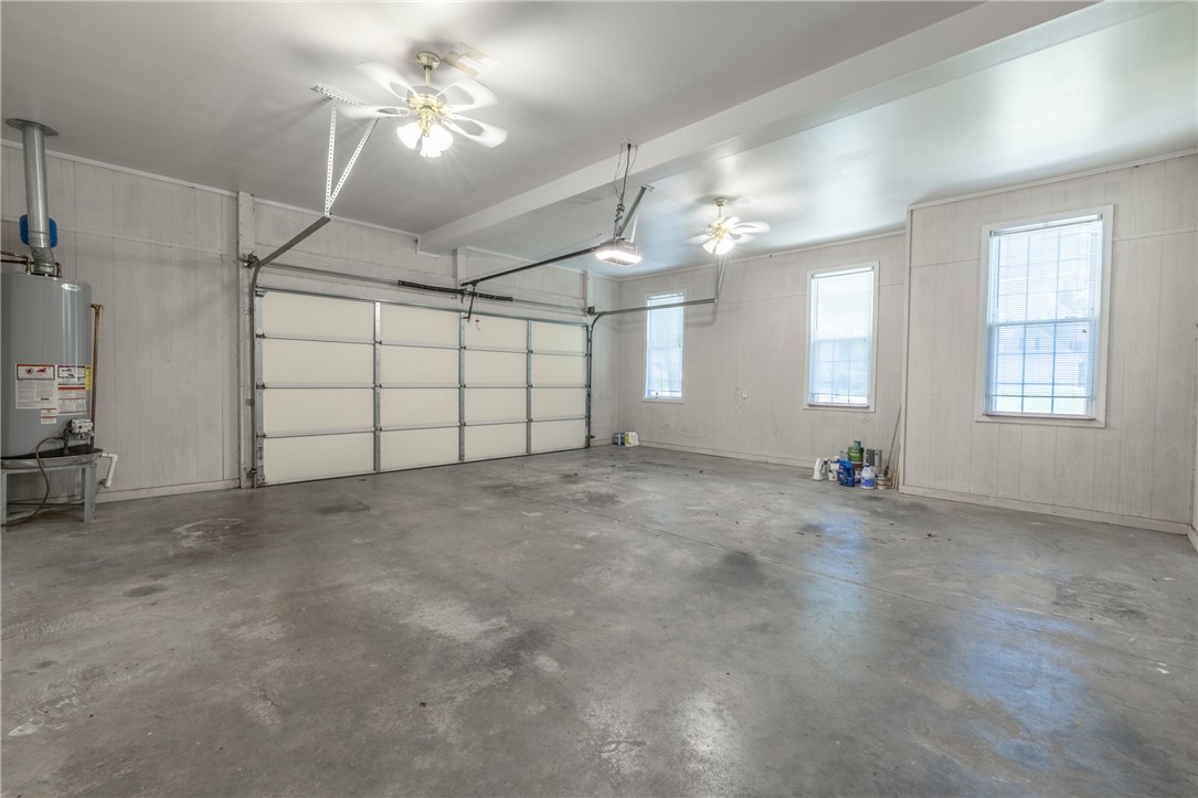 110 Brookstone Way Central, SC 29630 - Photo 29 of 46 This spacious garage offers ample room for vehicles and storage, featuring durable concrete flooring.