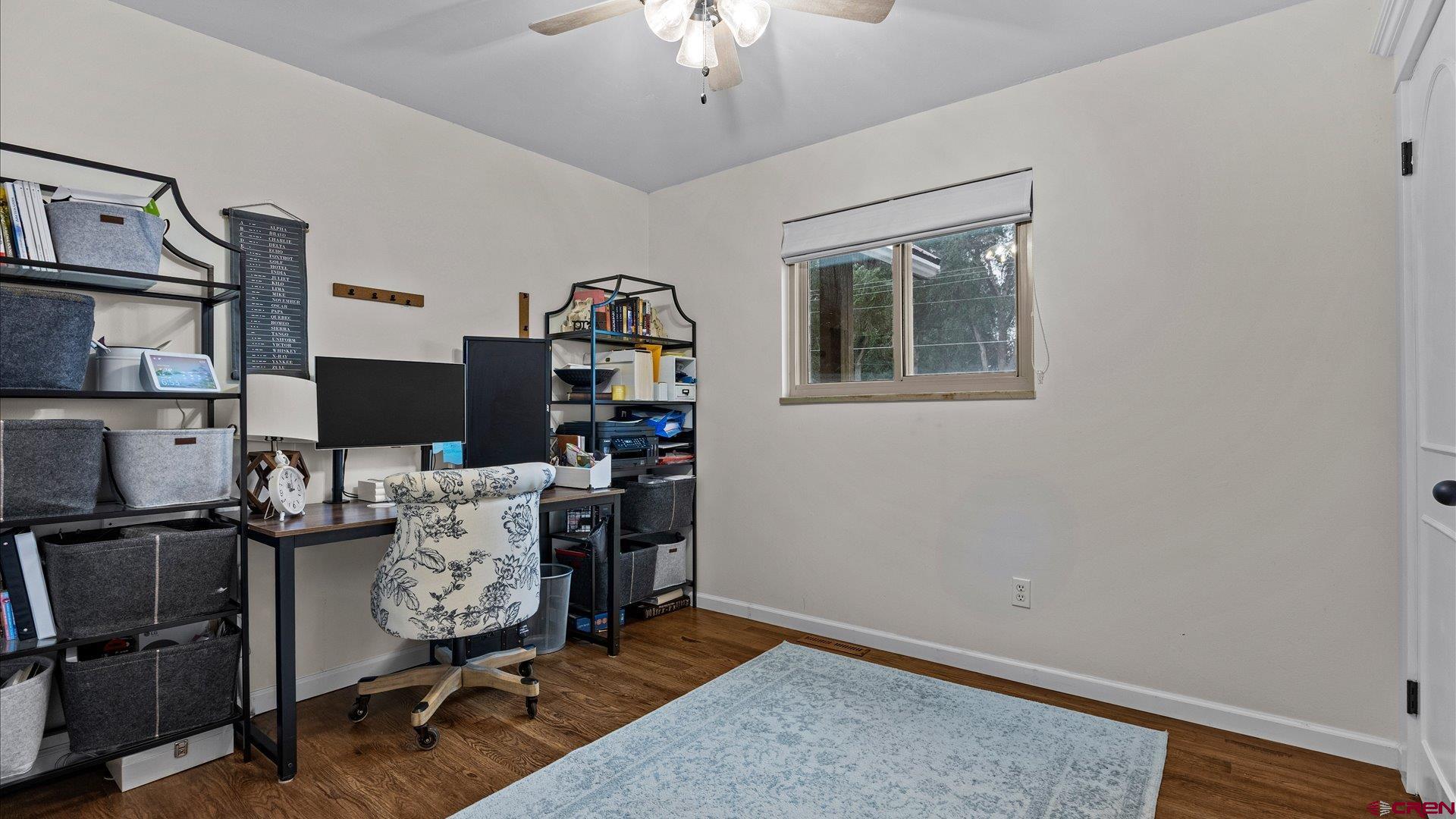 1761 G Road Delta, CO 81416 - Photo 14 of 43 a workspace with furniture and window
