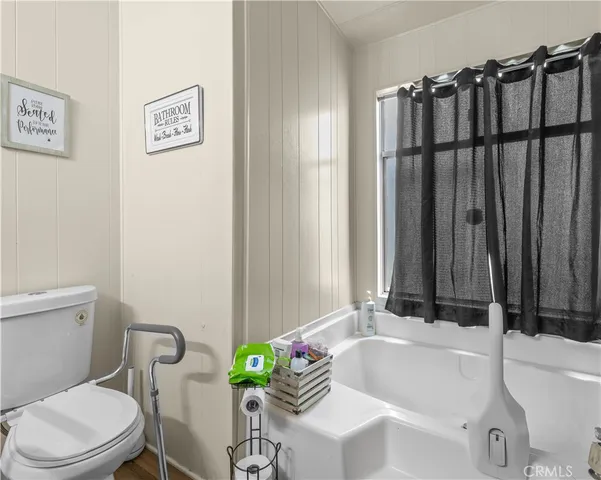 a bathroom with a sink and toilet