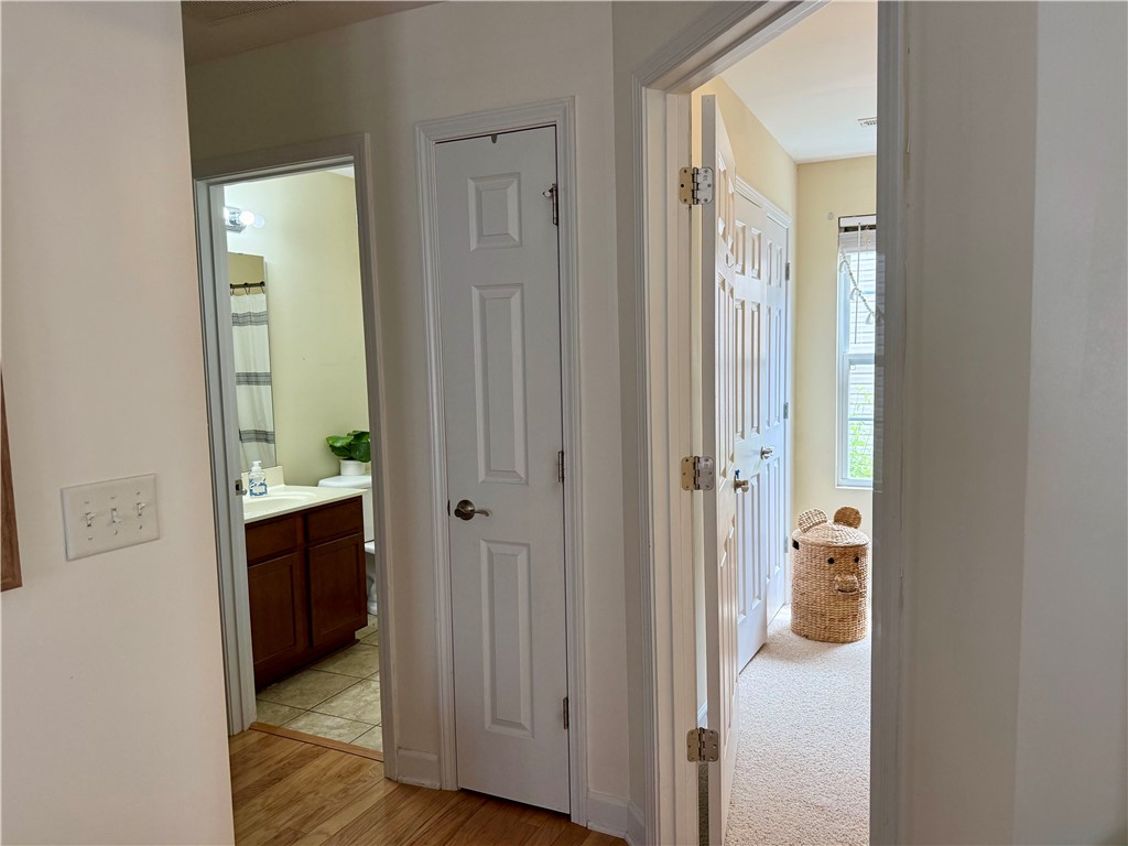 123 Abigail Lane Anderson, SC 29621 - Photo 16 of 22 This interior hallway connects to a bathroom and another room, offering practical flow within the home.