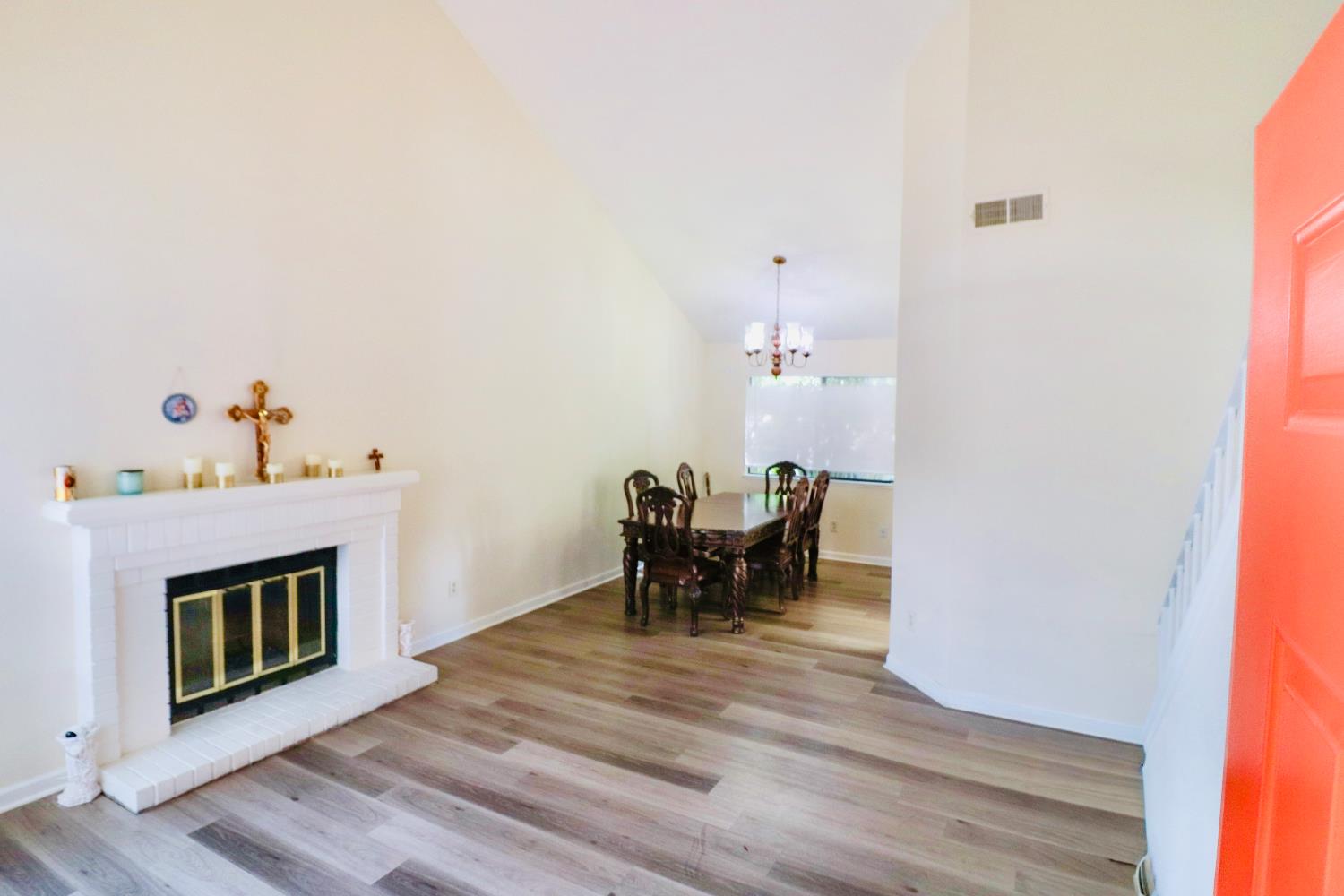 1188 Rio Royal Way Sacramento, CA 95834 - Photo 8 of 20 a view of dining room with furniture and a fireplace