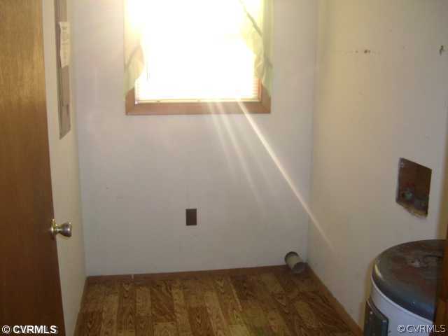 4230 Wakema Road West Point, VA 23181 - Photo 8 of 11 a bathroom with a window