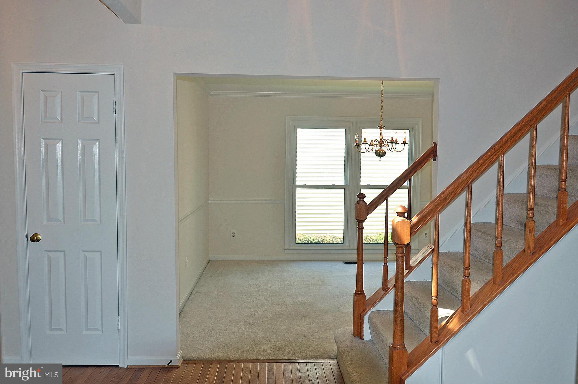 6718 Morning Ride Circle Alexandria, VA 22315 - Photo 10 of 30 Foyer and Dining Room